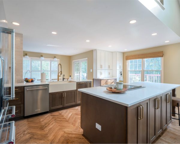 Kitchen layout, island and natural light in the completed Rockville project by BST Design & Build