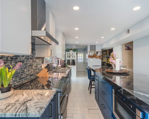 Completed Alexandria kitchen by BST Design & Build with coordinated cabinetry, lighting and tile finishes